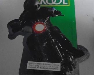 Metal Kool cigarette sign with motorcycle