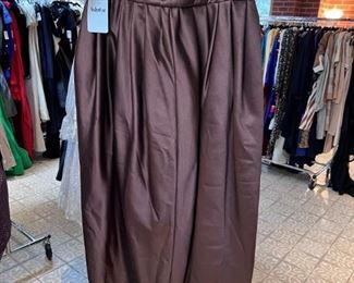 There are 28 racks of vintage and contemporary couture clothing..  This is a Valentino silk skirt