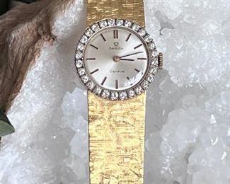 Omega 14k gold and diamond watch.  It keeps perfect time!
