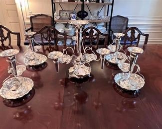 Center epergne is Victorian sterling!  The other four epergnes are silver plated