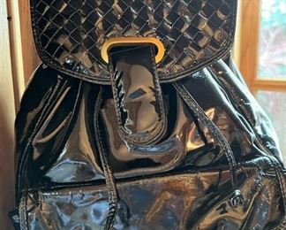 Vintage black patent leather Bottega Veneta backpack in mint condition.  Just think of the insider knowing looks you’d get if you snagged this!  Retro Rocks!