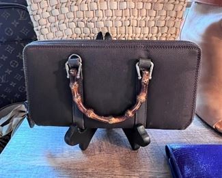 Vintage Gucci wallet with bamboo handles.  I sort or really want this….but I can’t buy before a sale either!