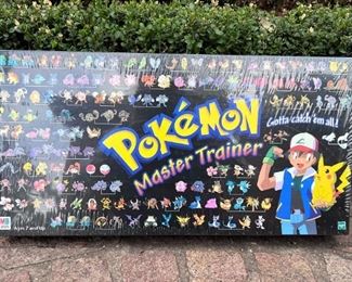 New in the box…Pokémon Master Trainer game.  This is awesome!