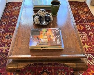 Vintage coffee table - this table would be amazing lacquered white, black or a really fun color!  The hand woven rug is a Moroccan tribal rug