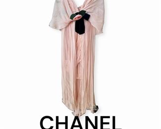 Chanel Haute Couture gown,  This is one of a kind created for the owner.  The dress is knee length and gathered in front with longer panels hanging to the floor.  There are also two long “scarf pieces” connected at the shoulders that can be thrown over the shoulders and trails in back