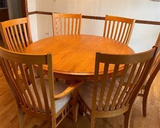 Dining table with 3 Leaves and 6 Chairs