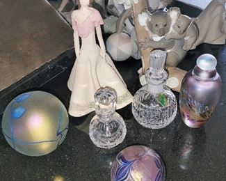 Perfume bottles Villeroy Boch and Waterford, Paperweights by Eickhart and Zellique, Lladro Koala Mother and Cub and pottery girl