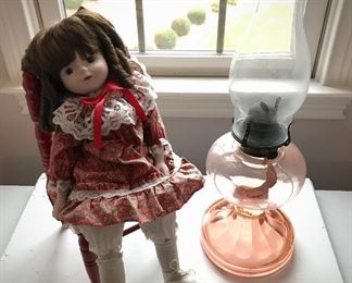 Porcelain Doll and Hurricane Lamp 