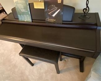 Yamaha Clavinova CLP370 Digital Piano with synthetic ivory and natural wood keys, and matching bench. Excellent condition!