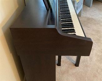 Yamaha Clavinova CLP370 Digital Piano with synthetic ivory and natural wood keys, and matching bench. Excellent condition!