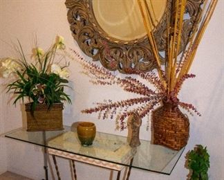 Glass table with decorations, mirror
