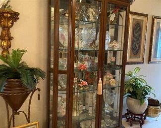 Full of the very best, this lovely glass cabinet is perfect for your treasures.