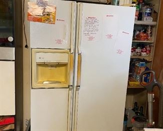 . . . a nice, functional fridge -- notice stainless steel microwave on top
