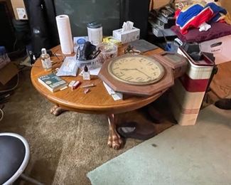 . . . what have we here?  -- a clawfoot coffee table, an antique regulator clock, and other miscellaneous goodies!