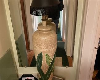 . .. this is a standing pottery lamp