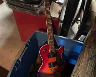 . . . a Harmony guitar