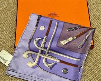 Hermes scarf, walking sticks.