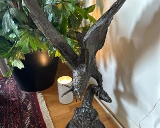Large bronze eagle sculpture.