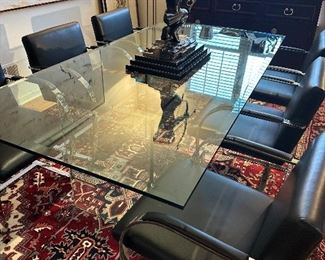 Large Pace glass dining table and 6 vintage   Brno chairs in perfect condition.