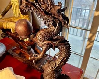 Large carved wood dragon figure.
