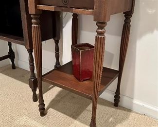 A couple of small antique wood side tables.