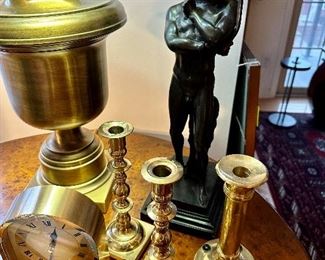 Brass lamp, candlesticks, brass Howard Miller clock & bronze nude.