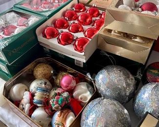 Christmas ornaments, many in boxes.