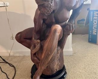 Carved wood sculpture, after "A River" by J. Caffieri.