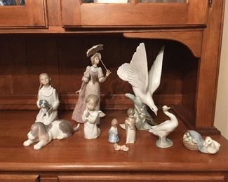 Lladro porcelain figurines 
5743 –Girl with cats (with box) 
1072 – Sleeping Puppy
4895 – Mother duck with ducklings (with box) 
4538 – Kneeling angel (with box)
Kneeling girl with dog
Duck
4550 – Turtle Dove 12” (with box)
5324 English Lady (1985, with box) 
Nativity Ornament Set