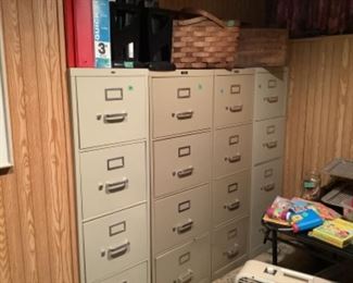 Four metal file cabinets