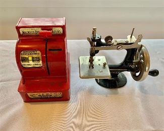 Vintage cash register and sewing machine 