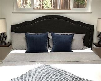 King, dark grey upholstered headboard. Two available. 