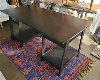 Trestle style black wood desk. Good condition, some scratches on the top and on the legs (easy to fix with Minwax wood stain pencil/marker or Howard’s Restor-a-Finish).  Top comes off.
Large working area with 4 open storage shelves below.
Dimensions: 64"L x 30"W x 29"H
(Original price new is $445)