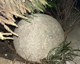 Large, HEAVY concrete spheres.  There are two of these.