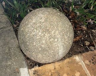Large, HEAVY concrete spheres.  There are two of these.