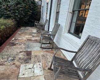 Teak rocking chairs.  There are four.  Also a small matching table.  