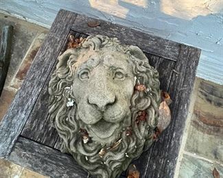Concrete lion heads - there are two of these.