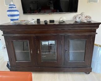 Large chest with three doors.  Great TV and electronic equipment cabinet.  This piece is super heavy.