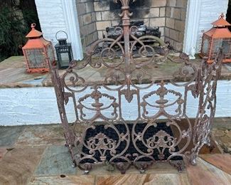 Wrought iron fireplace screen.