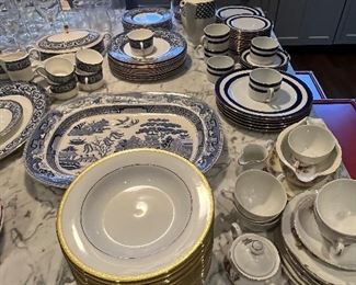 Various place settings - You can see the Ralph Lauren patterns in the background.  There is a Lenox classic design in the foreground.  The platters are a different pattern.