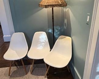 MCM white chairs.  One is missing a leg.