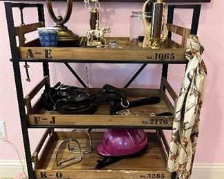 Cool shelf! Lots of great English riding decor. 