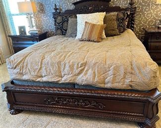 California king bed and nightstands . The bedding is custom made for this particular bed. There is one bed spread. Six euro sham pillows. Two king-size shams, two king-size pillows and one small.pillow!