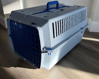Medium size dog crate. This also has wheels and a pull on top to easily move your dog around. Would be awesome for an airport visit.