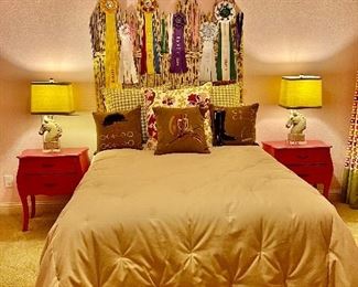 Awesome equestrian bedroom. The bedding has been custom-made. There are English riding pieces in this room. Including horse tack  ( the lamps are not included)