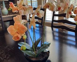 Lots of faux plants and arrangements 