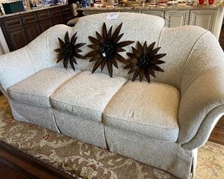 Custom made sofa with beautiful lines. The middle flowers are made from. UTTERMOST. 