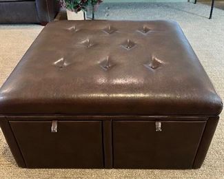 This is an awesome large ottoman from Hammary. It is on wheels and also has two drawers that pull out.!