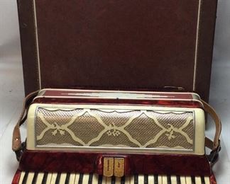 VTG. RED ACCORDION WITH THE