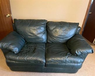 Leather Love Seat with removable cushions. 
